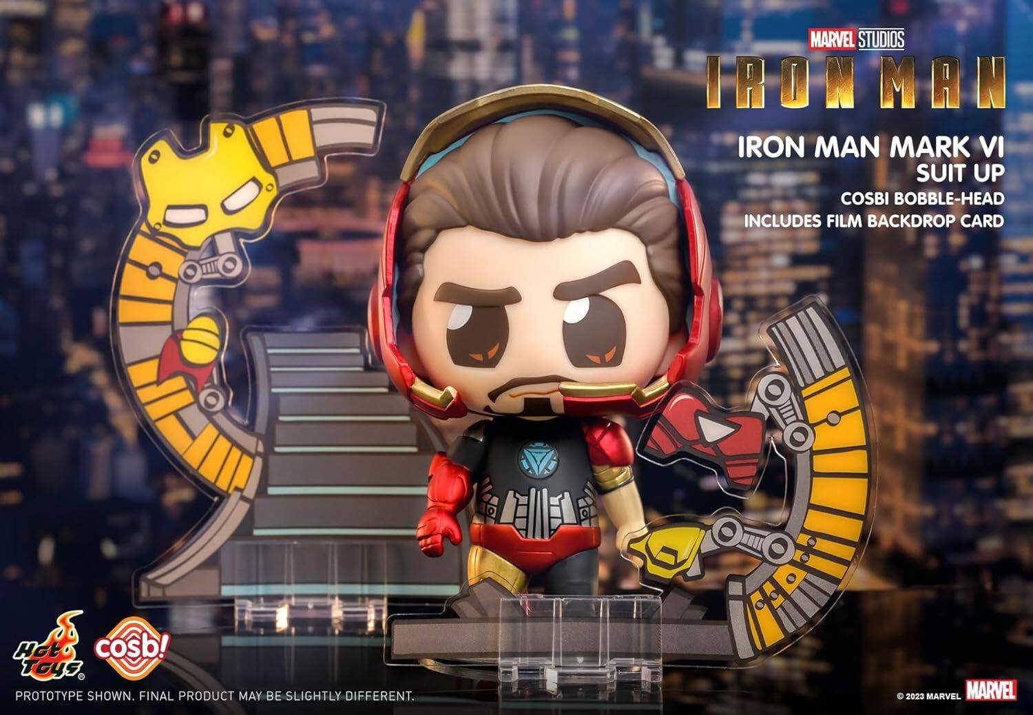 MARVEL STUDIOS IRON MAN IRON MAN MARK VI SUIT UP COSBI BOBBLE-HEAD INCLUDES FILM BACKDROP CARD  
Hot Toys  
cosb!  
PROTOTYPE SHOWN. FINAL PRODUCT MAY BE SLIGHTLY DIFFERENT.  
© 2023 MARVEL