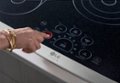 Left. LG - STUDIO 30" Built-In Electric Cooktop with 5 Elements and Warming Zone - Stainless Steel.