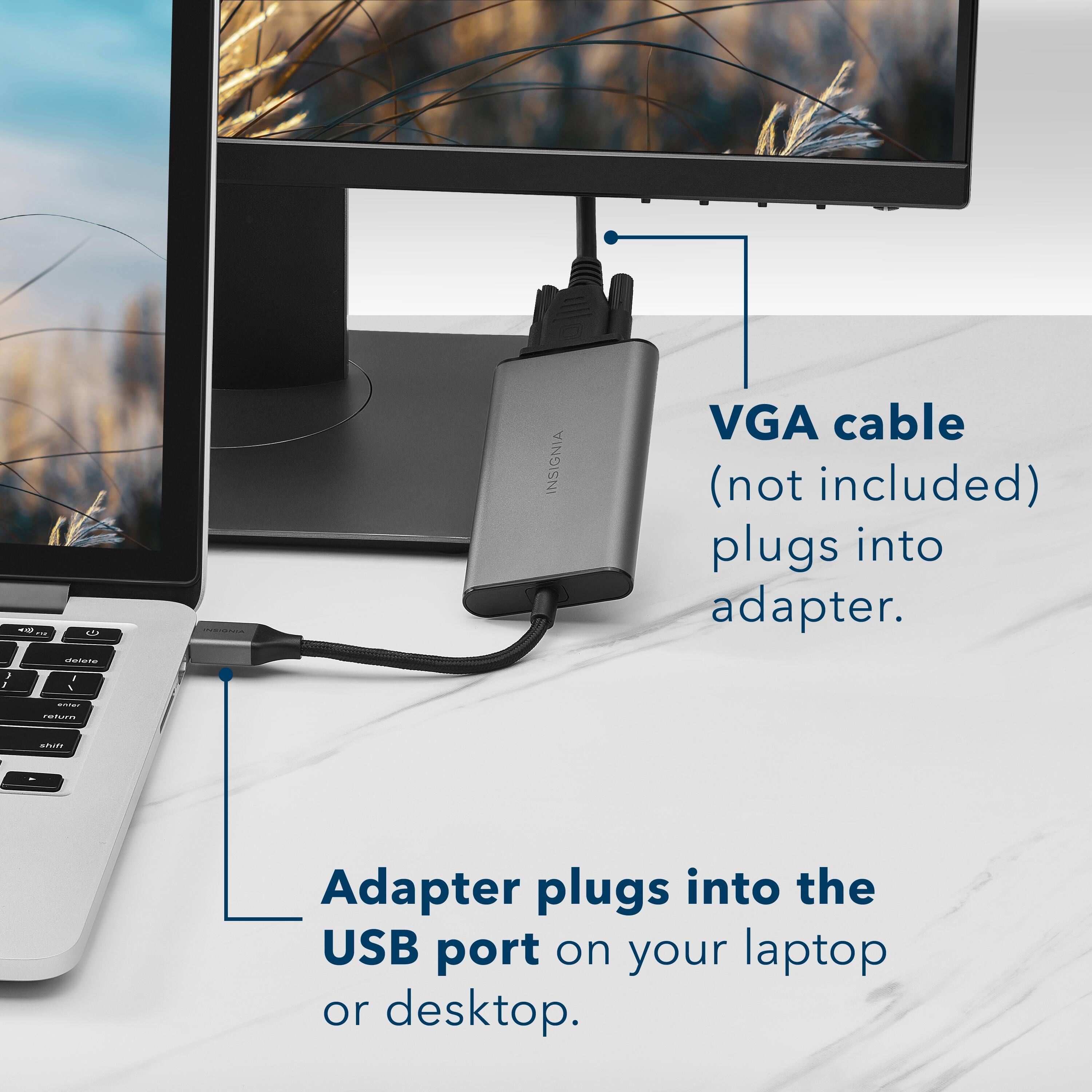 The image shows a laptop computer with a VGA cable plugged into an adapter. The text below the image explains that the VGA cable plugs into the adapter, which in turn plugs into the USB port on the laptop or desktop. This setup allows for the connection of an external monitor to the laptop or desktop for better display and viewing experience.