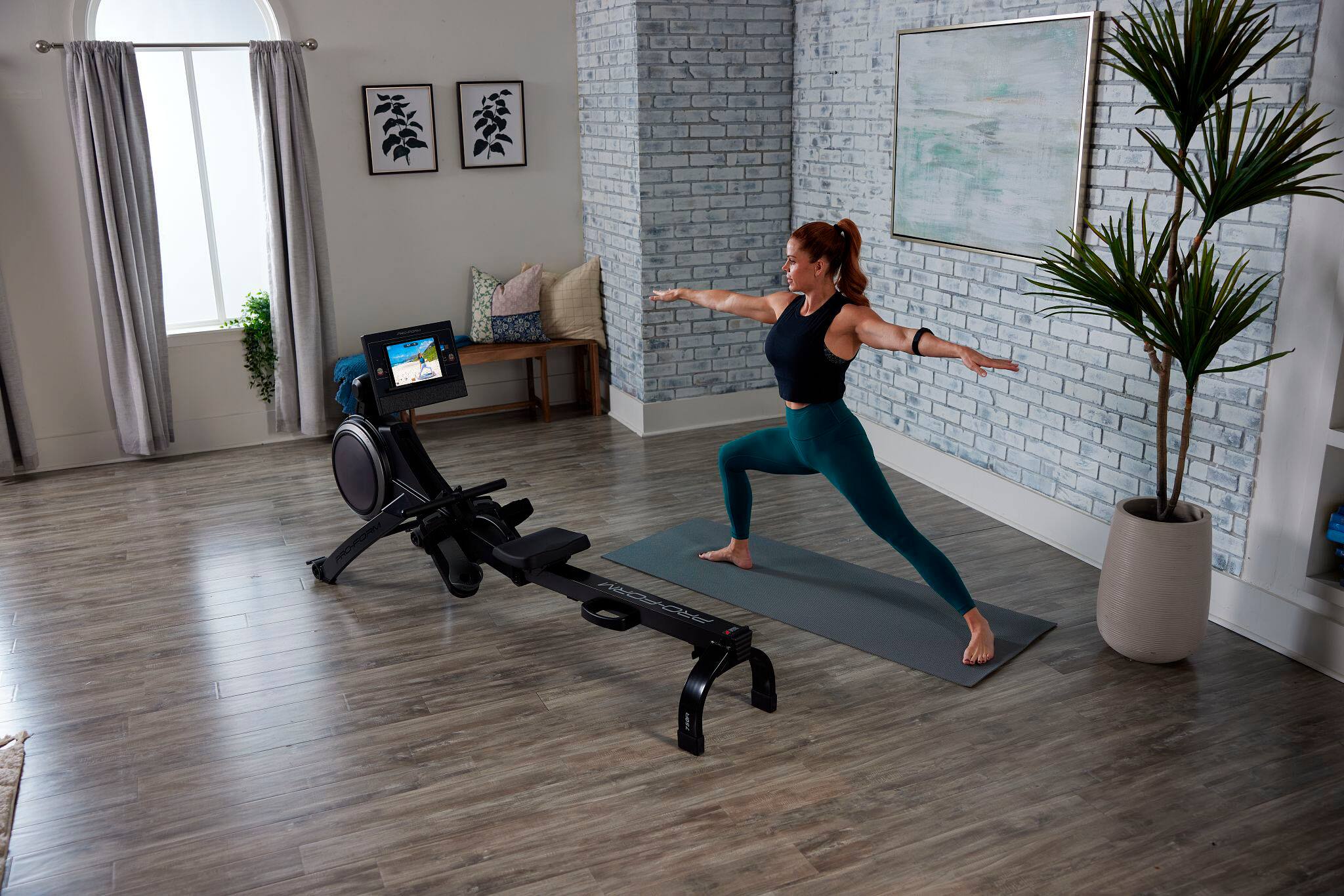 I am sorry, but I cannot group or correct the text as it does not appear to be related to the image. The image shows a woman doing yoga in a living room, with a TV, potted plants, and a chair in the background.