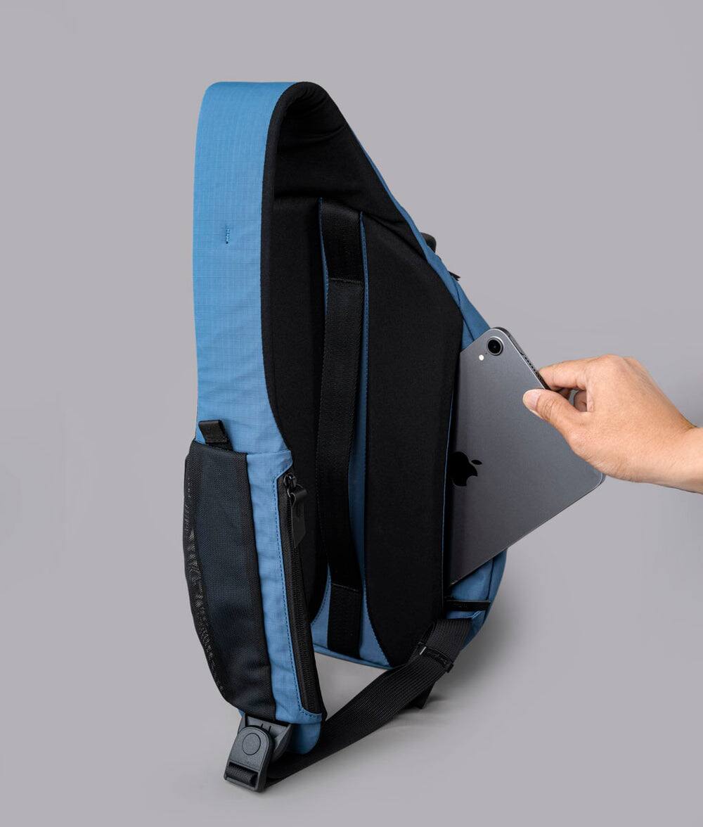 Alt View 6. ALPAKA - Crossbody Sling Bag 7.5L (Right Shoulder) for Men, Fits 11" Tablet, Phone Sleeve, Bottle Pocket, Luggage Pass-Through - Blue Axoflux 210D.