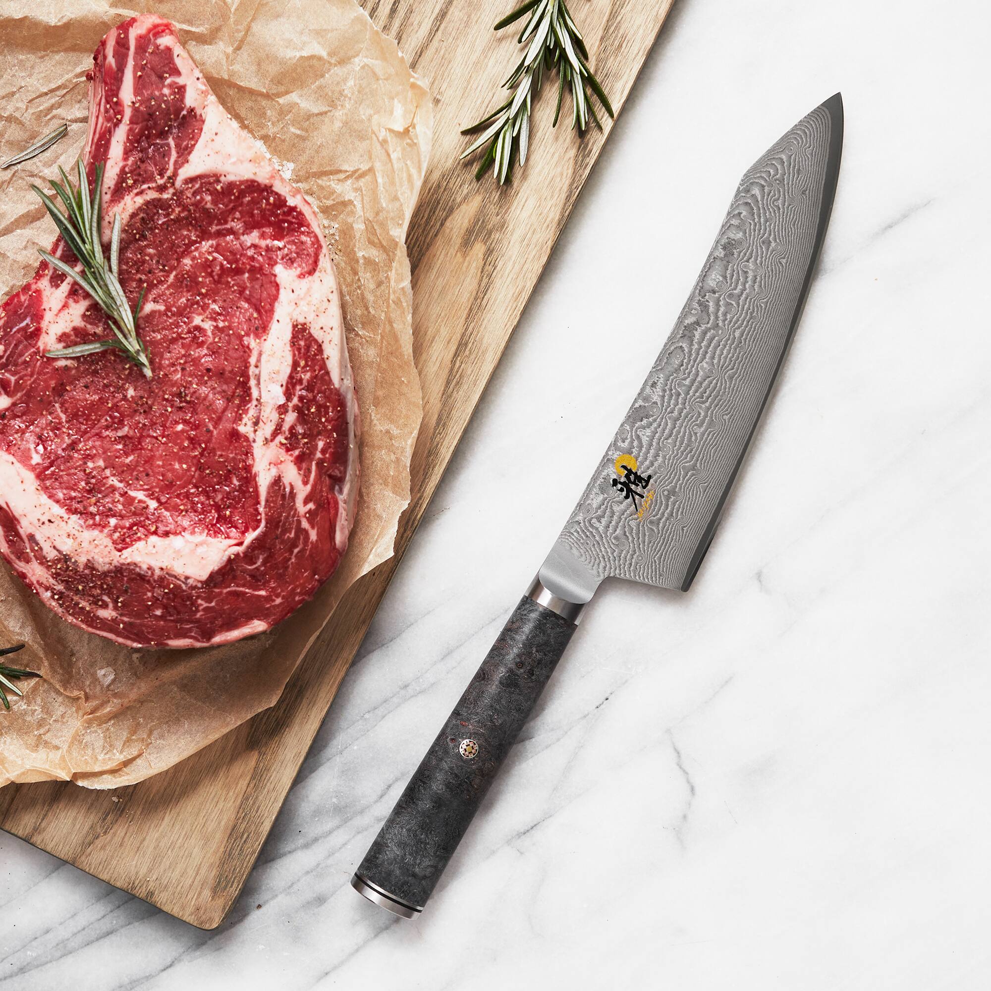 Alt View 1. Miyabi - Miyabi Black 5000MCD67 7-inch Rocking Santoku Knife - White.