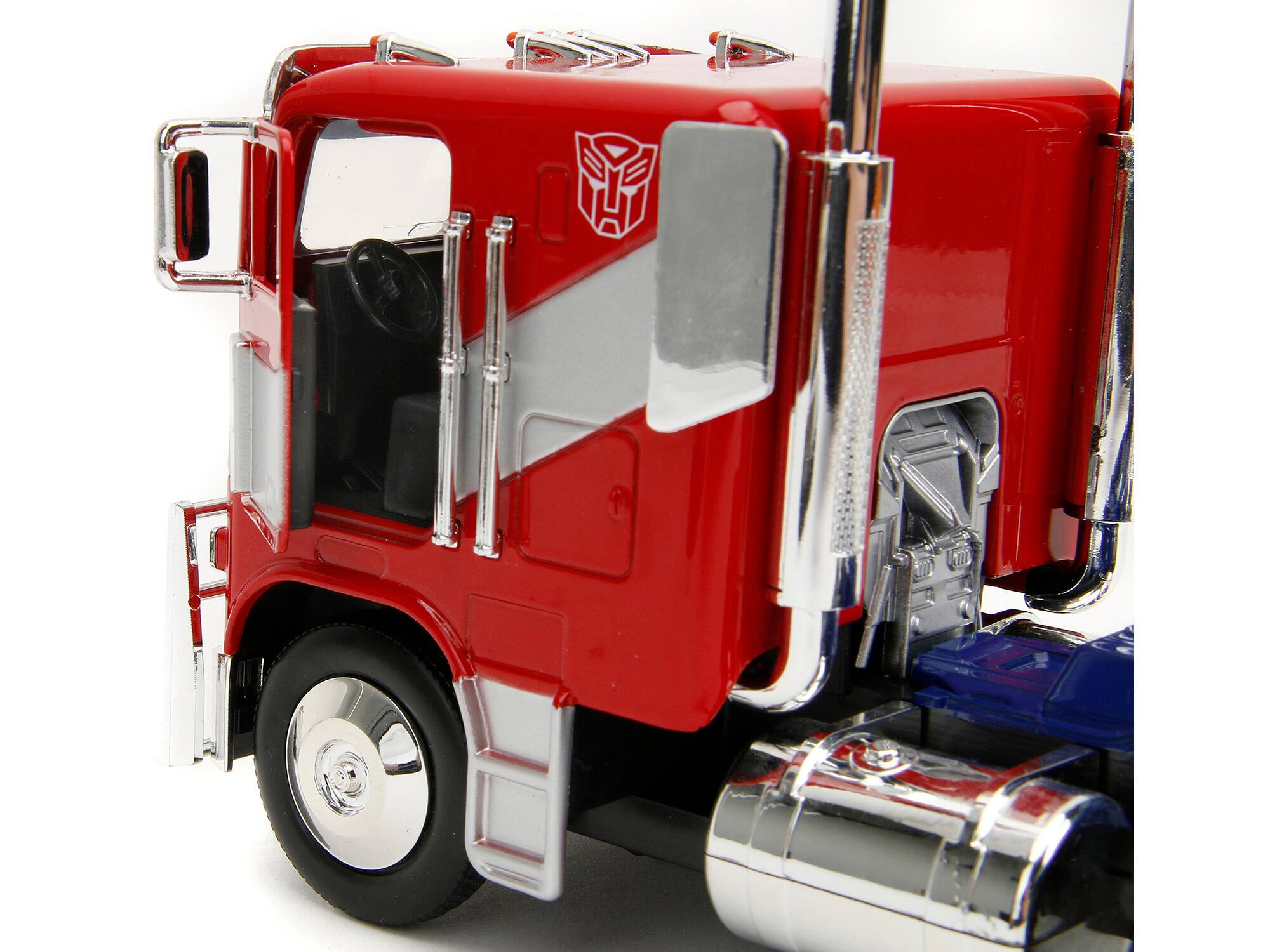 Angle. Jada - Optimus Prime Tractor Truck Red & Blue Silver Stripes Transformers Rise of the Beasts 2023 Movie Hollywood Rides - Red And Blue With Silver.