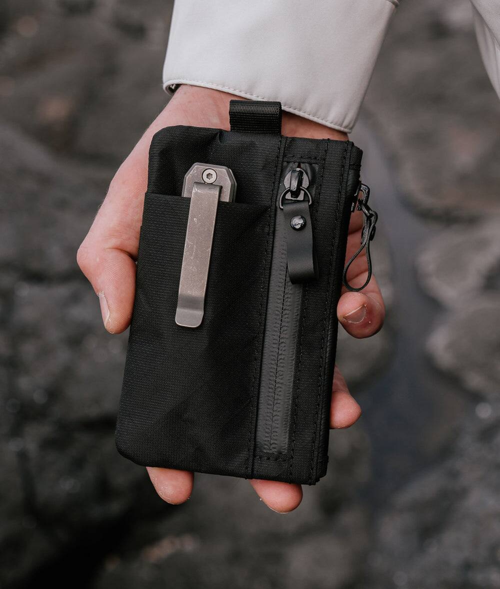 Angle. ALPAKA - Zip Pouch Pro RFID Wallet Pouch, Fits 4-12 Cards, Cash/Coin Pocket, 3 External EDC Slots - Black Ultradyne 100D.