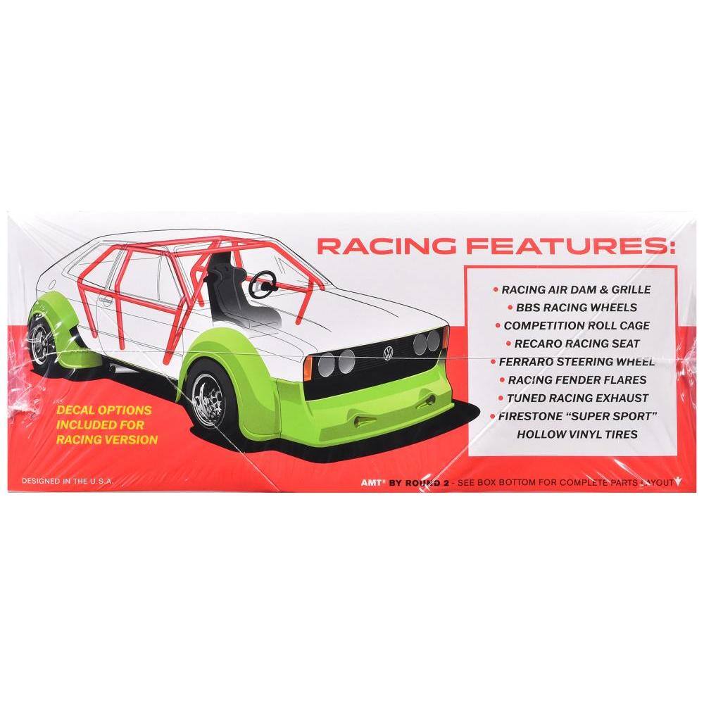RACING FEATURES:  
- RACING AIR DAM & GRILLE  
- BBS RACING WHEELS  
- COMPETITION ROLL CAGE  
- RECARO RACING SEAT  
- FERRARO STEERING WHEEL  
- RACING FENDER FLARES  
- TUNED RACING EXHAUST  
- FIRESTONE "SUPER SPORT" HOLLOW VINYL TIRES  

DECAL OPTIONS INCLUDED FOR RACING VERSION  

DESIGNED IN THE U.S.A.  

AMT® BY ROUNO 2 - SEE BOX BOTTOM FOR COMPLETE PARTS LAYOUT