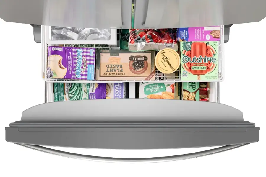 The image shows a refrigerator with a variety of food items stored in it. There are several bottles, including a bottle of peanut butter, and a container of jelly. There are also multiple sandwiches, with one placed on the top shelf and another on the bottom shelf. Additionally, there are two bowls in the refrigerator, one on the top shelf and the other on the bottom shelf. The refrigerator is filled with a variety of food items, making it a well-stocked and convenient place for meal preparation.
