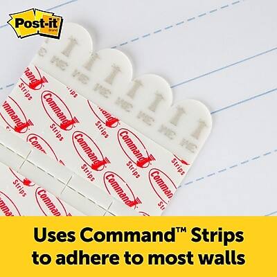 Post-it Command Strips

Uses Command™ Strips to adhere to most walls