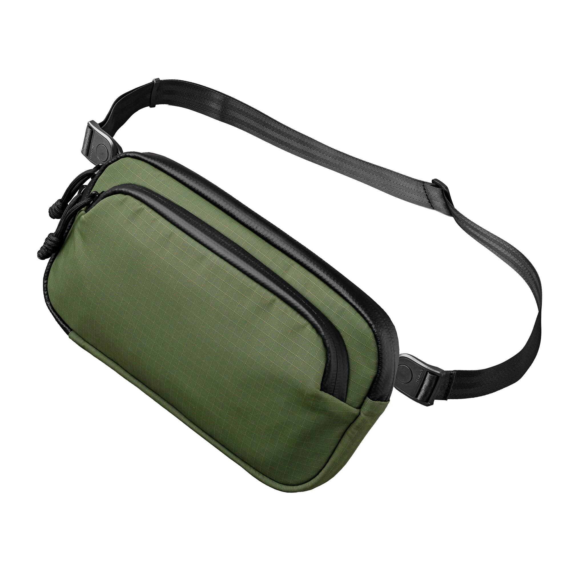 Front. ALPAKA - Bravo Passport Pouch Sling Bag for Men, Passport Holder for Travel, Fits iPhone Pro Max, RFID, AirTag Sleeve - Green Axoflux 210D.