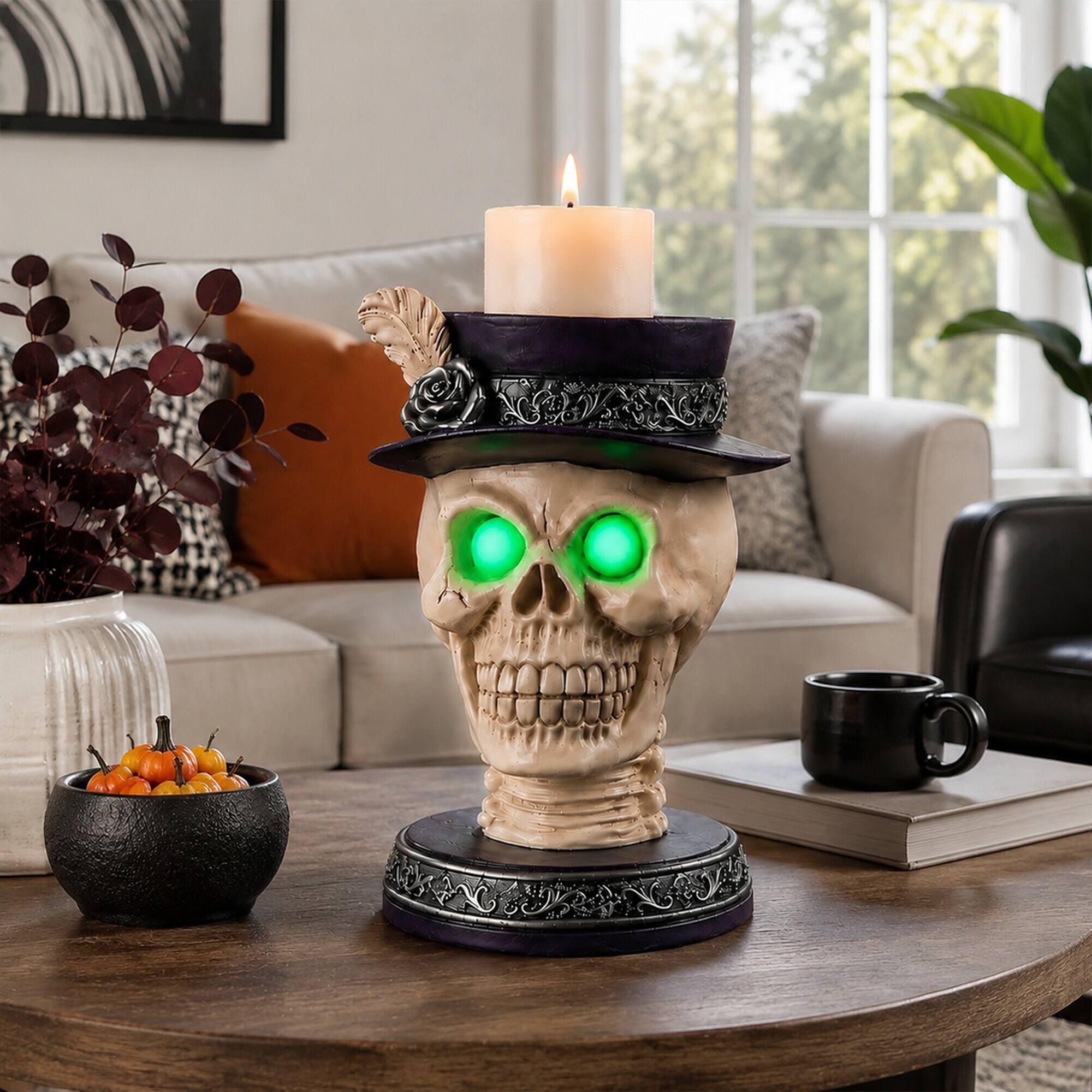 Back. RYHNUYNE - Gothic Skull Candle Holder Statue with Glowing Green LED Eyes and Victorian Feather Top Hat for Spooky Halloween - Black.