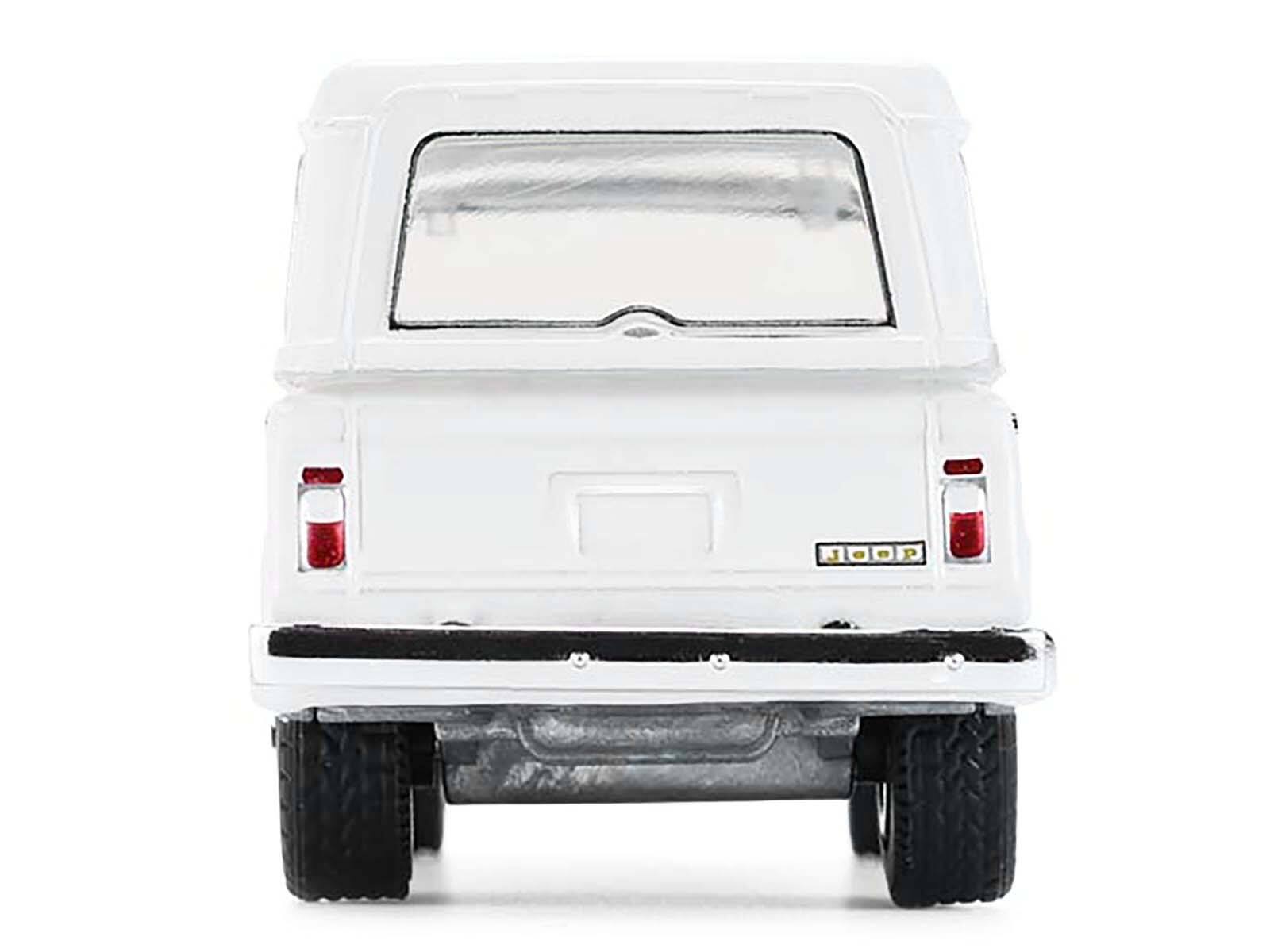 Alt View 5. Greenlight - 1971 Jeep Jeepster Commando White with Black Stripes "All Terrain" Series 1/64 Diecast Model Car by Greenlight.