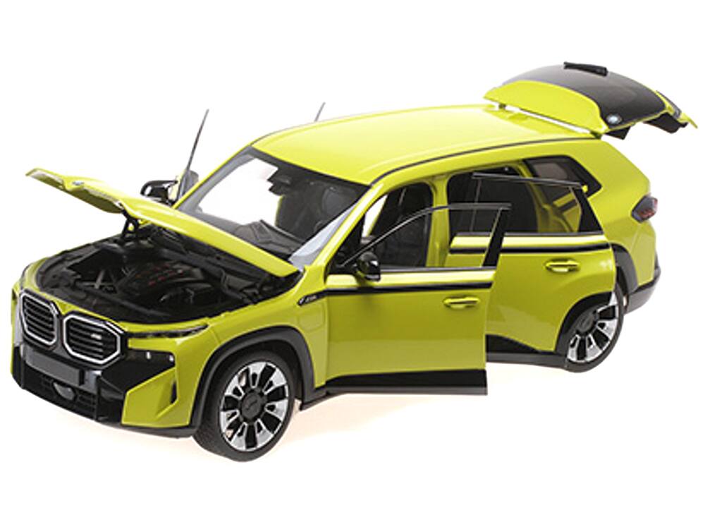 Angle. Minichamps - 2023 BMW XM Yellow with Black Stripes 1/18 Diecast Model Car by Minichamps - Yellow with Black.