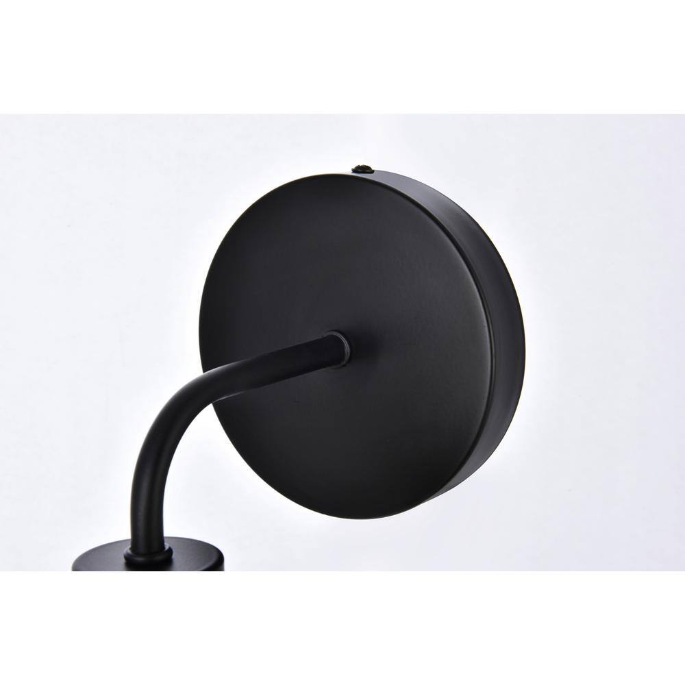 Left. Living District - Hanson 1 light bath sconce in black with clear shade - Black And Clear Shade.