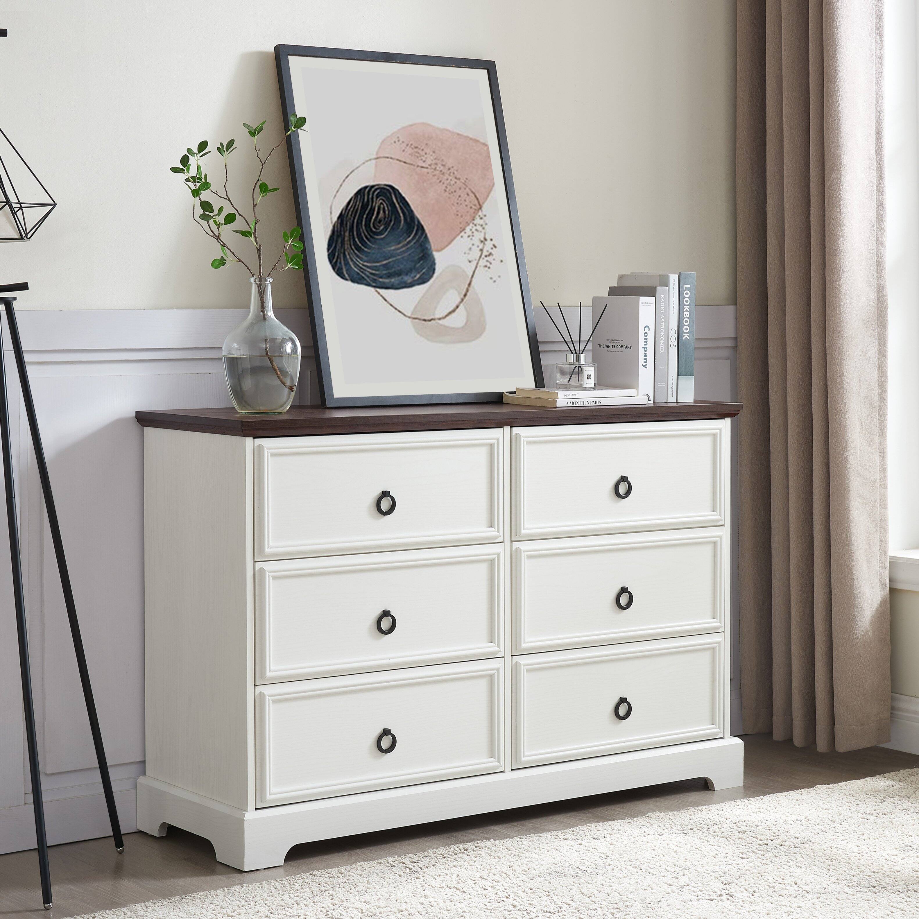 The text on the image is:

- "The Company"
- "LIVING ROOM"
- "LIVING ROOM"