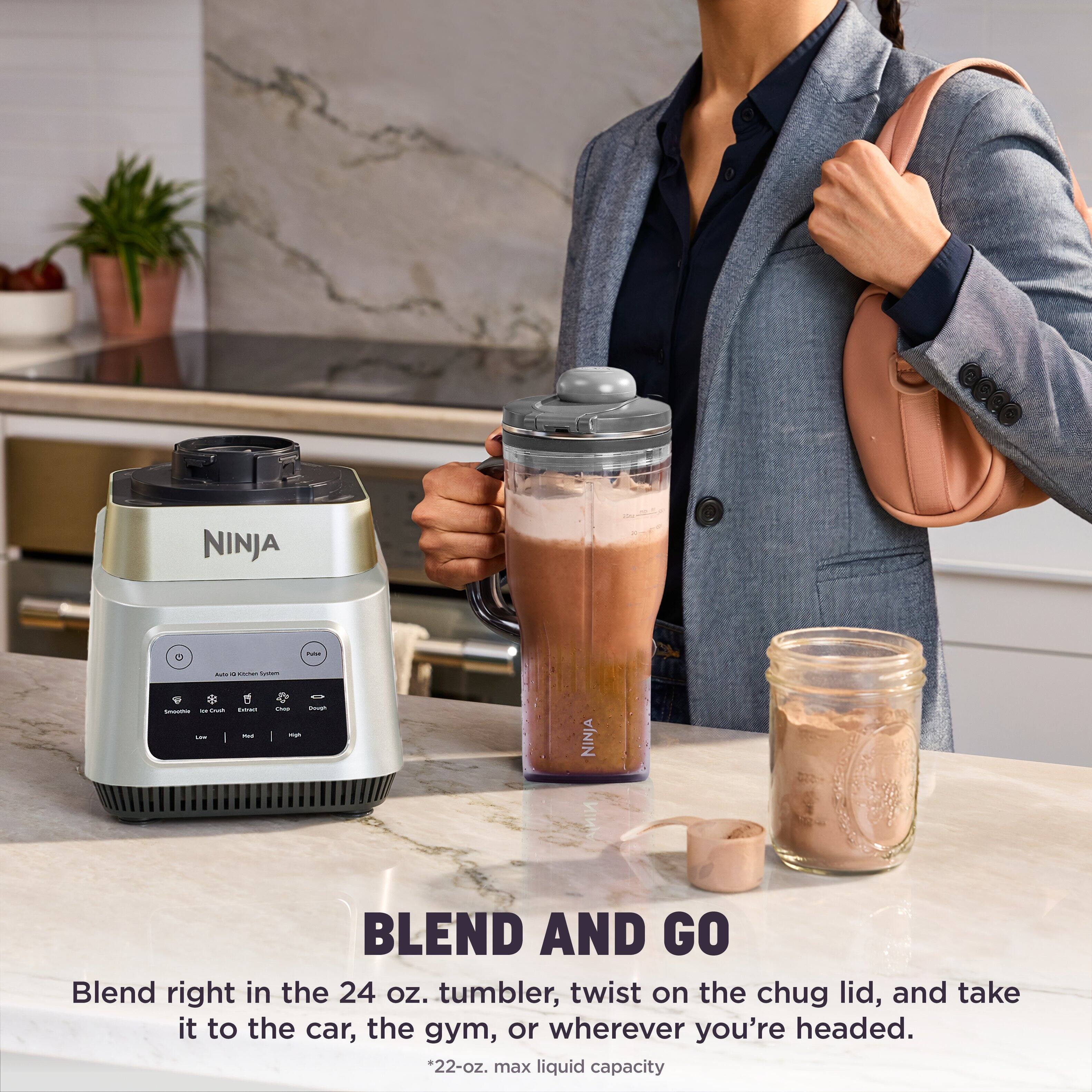 NINJA  
Vital  
ALITE 9 KILCHER - "Grain text DIO Dough Smoothie not high LOVE"  
NINJA ININ  
BLEND AND GO  
Blend right in the 24 oz. tumbler, twist on the chug lid, and take it to the car, the gym, or wherever you're headed.  
*22-oz. max liquid capacity