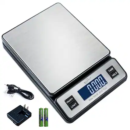 Sure, here is the corrected and grouped text from the image:
---
**WeightMax**
- **ON/OFF**
- **UNIT**
- **TARE**
- **HOLD**
**Max: 90LB d=0.1OZ**
---
**Included Accessories:**
- **USB Cable**
- **Power Adapter**
- **2x AA Batteries (WeightMax)**
---
**Note:** The text "I HaTo only. XAM AAASI MTDEMAX CHAL ON/OFF UNIT TARE HOLD WeighMax di 1 L.LLL d=0.1OZ = 1OZ Max:90LB Max" appears to be a mix of unrelated or possibly corrupted text and is not part of the product information.