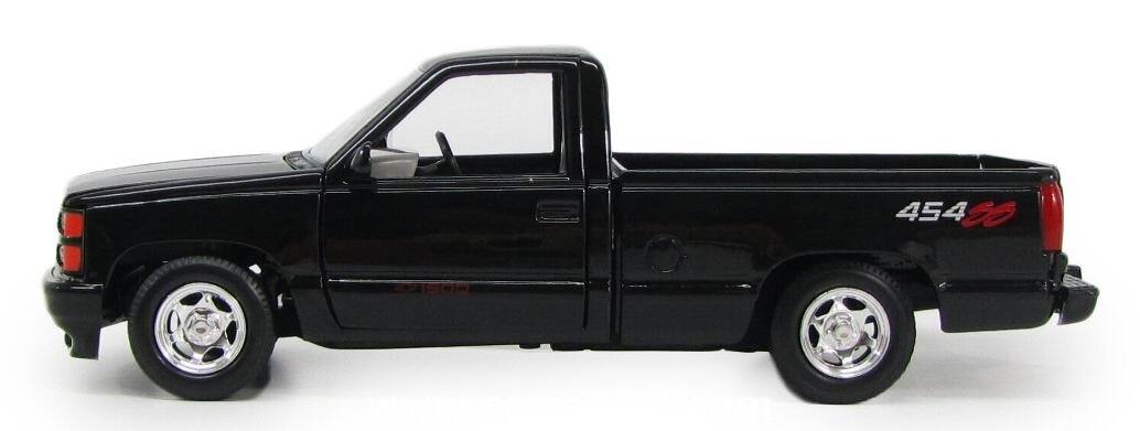 Left. Motormax - 1992 Chevrolet 454 SS Pickup Truck Black 1/24 Diecast Model Car by Motormax - Black .