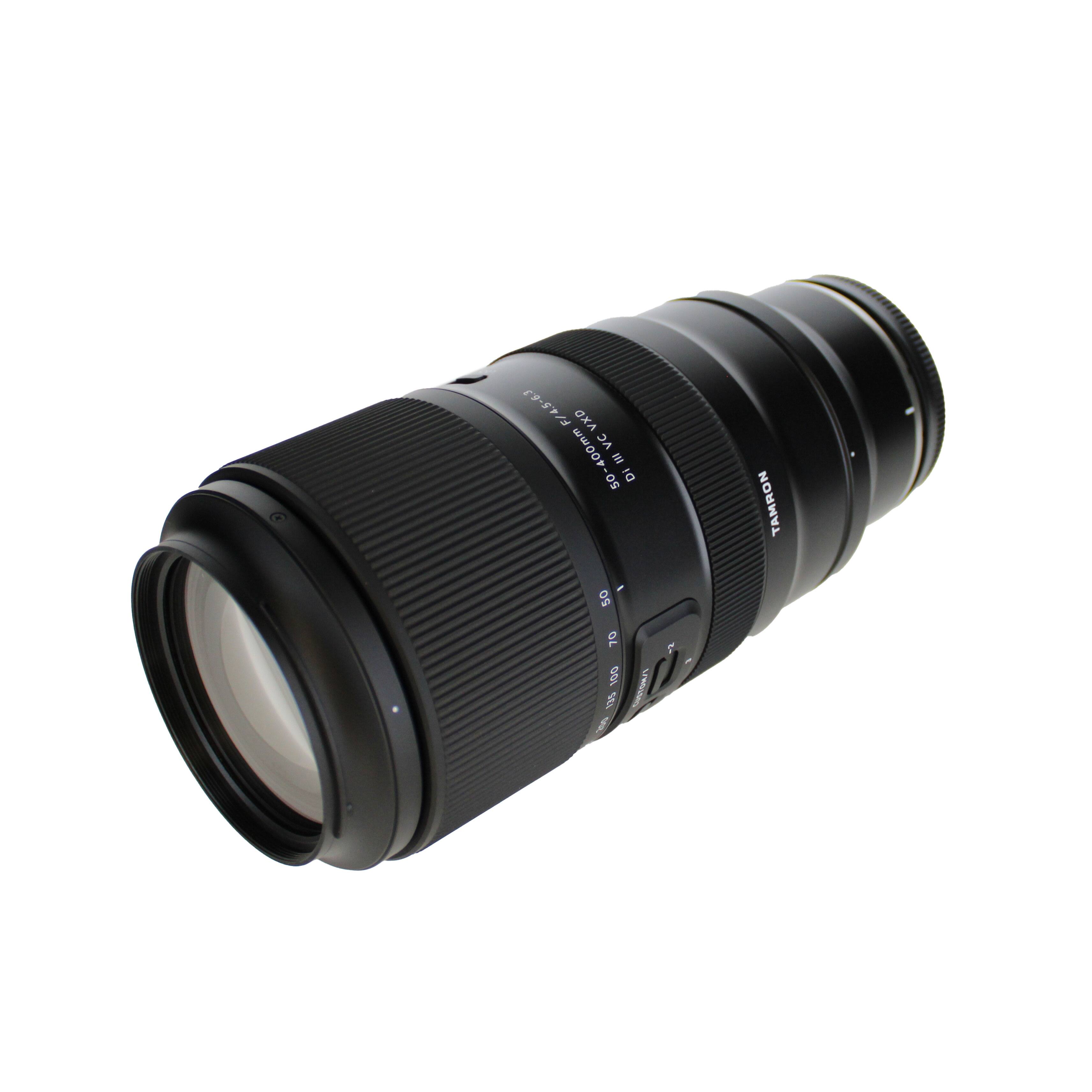 1951/8 VXD VC 50-400mm IM 50 DI TAMRON  
50 70 100 18% f Lelnte  
1:5 1:10  
18-100mm  
TAMRON