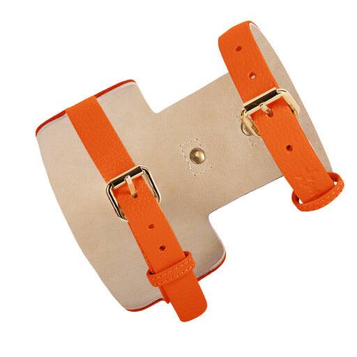 Angle. PoisePup - Luxe Adjustable Leather Harness Vest, Soft with Bow and Crystal for Dogs - Orange.