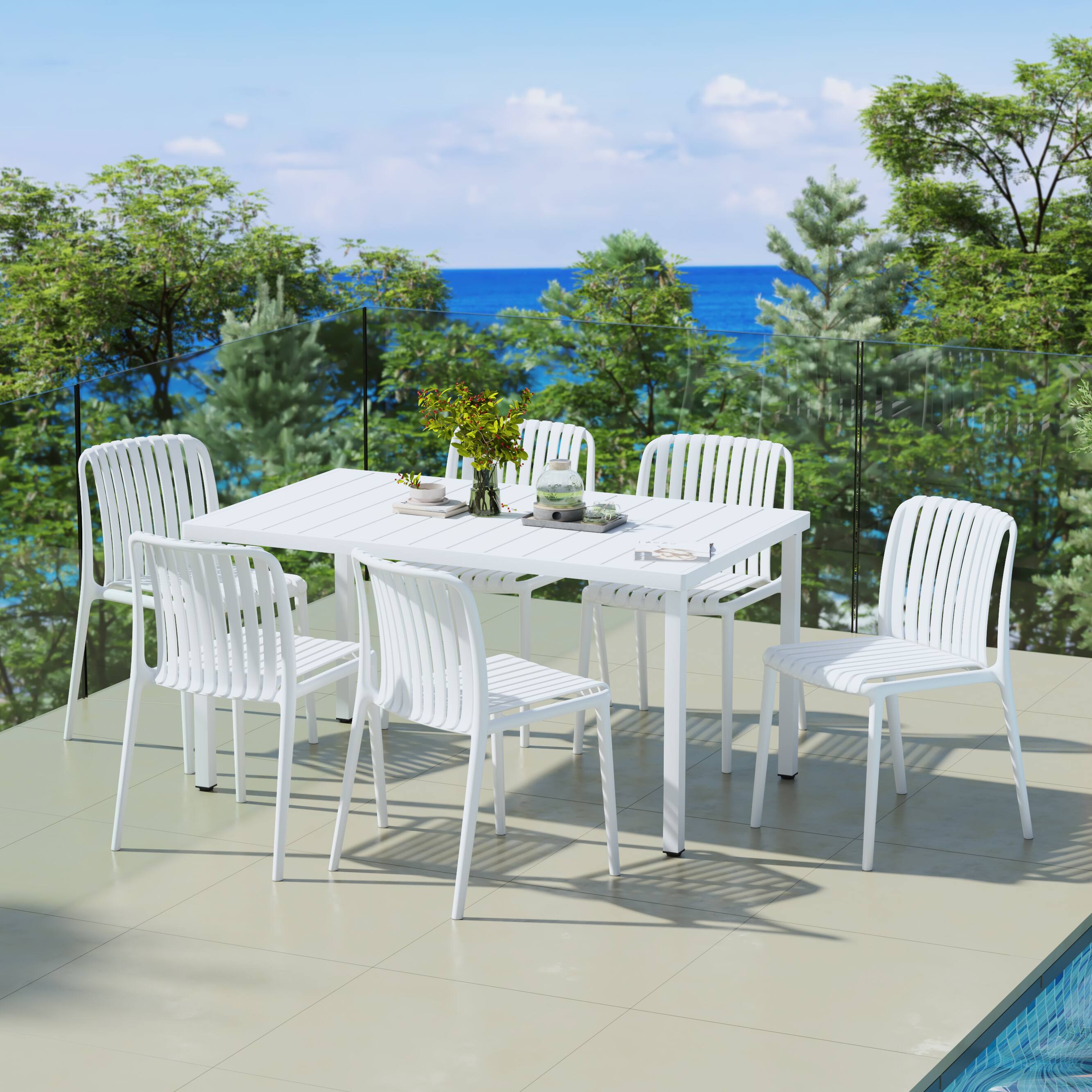 Angle. WestinTrends - WestinTrends Playa 7-Piece Outdoor Patio Dining Table Set With Stackable Patio Chairs - White.