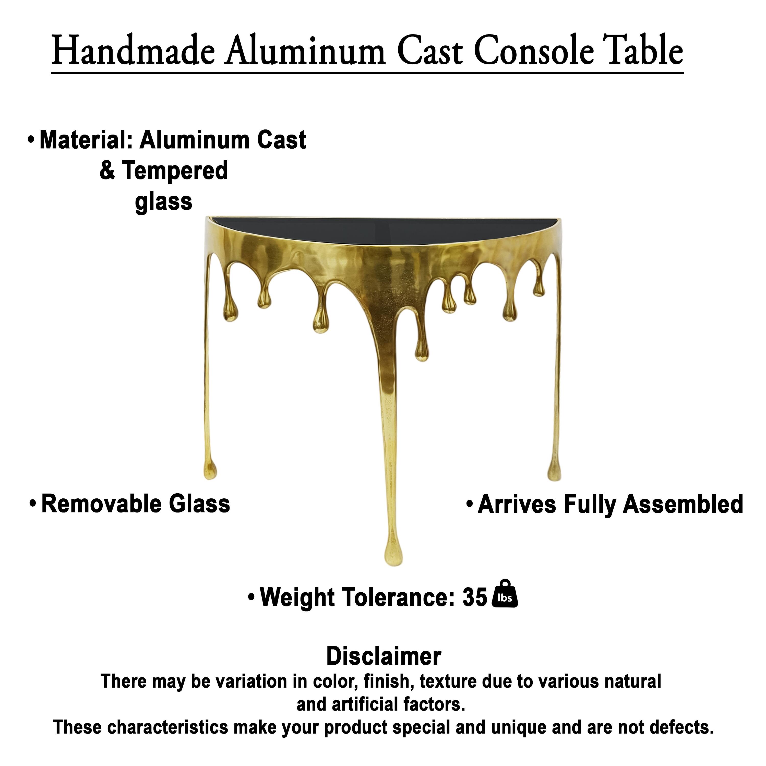 Handmade Aluminum Cast Console Table

- Material: Aluminum Cast & Tempered glass
- Removable Glass
- Arrives Fully Assembled
- Weight Tolerance: 35 lbs

Disclaimer
There may be variation in color, finish, texture due to various natural and artificial factors. These characteristics make your product special and unique and are not defects.