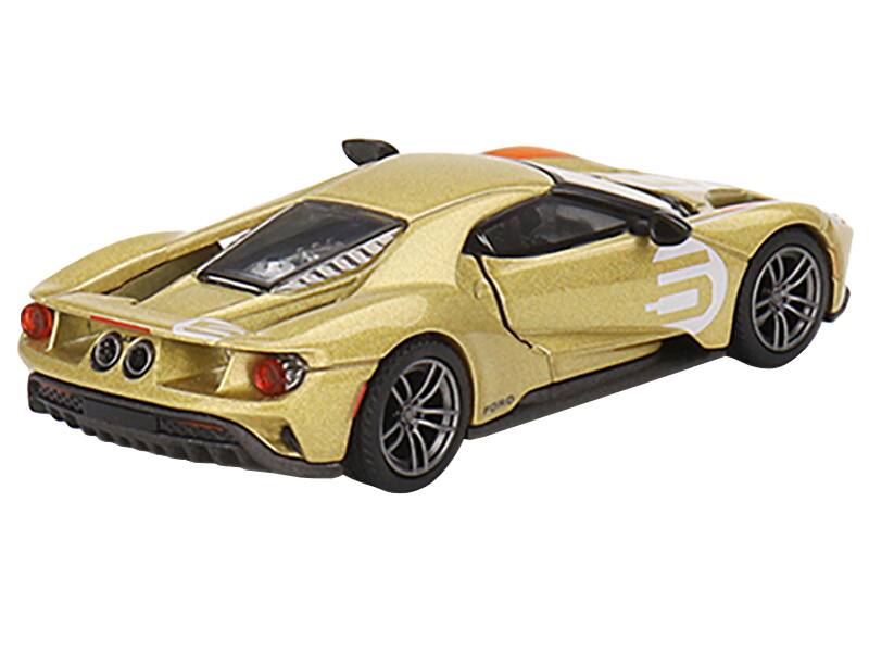 Angle. Mini GT - Ford GT #5 "Holman Moody Heritage Edition" Gold Metallic with Red Accents Limited Edition to 1800 pieces Worldwide 1/64 - Gold Metallic.