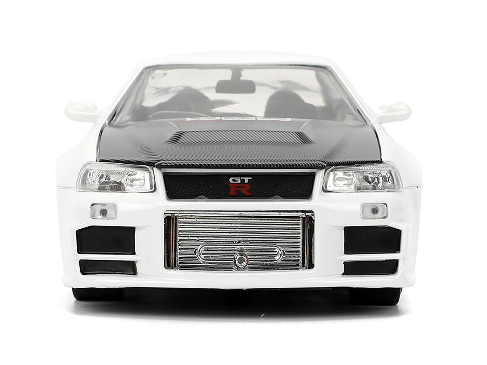 Alt View 5. Jada - 2002 Nissan Skyline GT-R (R34) "HKS Power" White with Carbon Hood and Graphics "JDM Tuners" 1/24 Model Car by Jada - Multicolor.