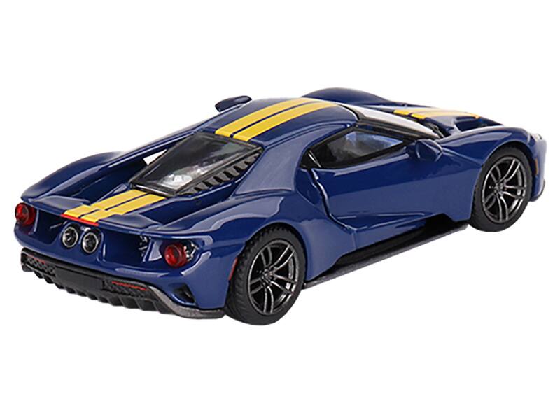 Left. Mini GT - Ford GT Sunoco Blue with Yellow Stripes Limited Edition to 3600 pieces Worldwide 1/64 Diecast Model Car by Mini GT - Blue And Yellow.