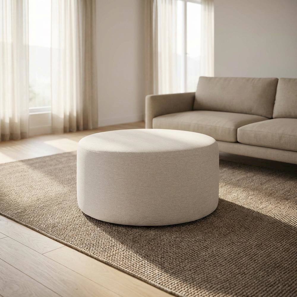 Angle. Outdoor Escape - Round Heathered Fabric Upholstered Ottoman for Outdoor Spaces - White.