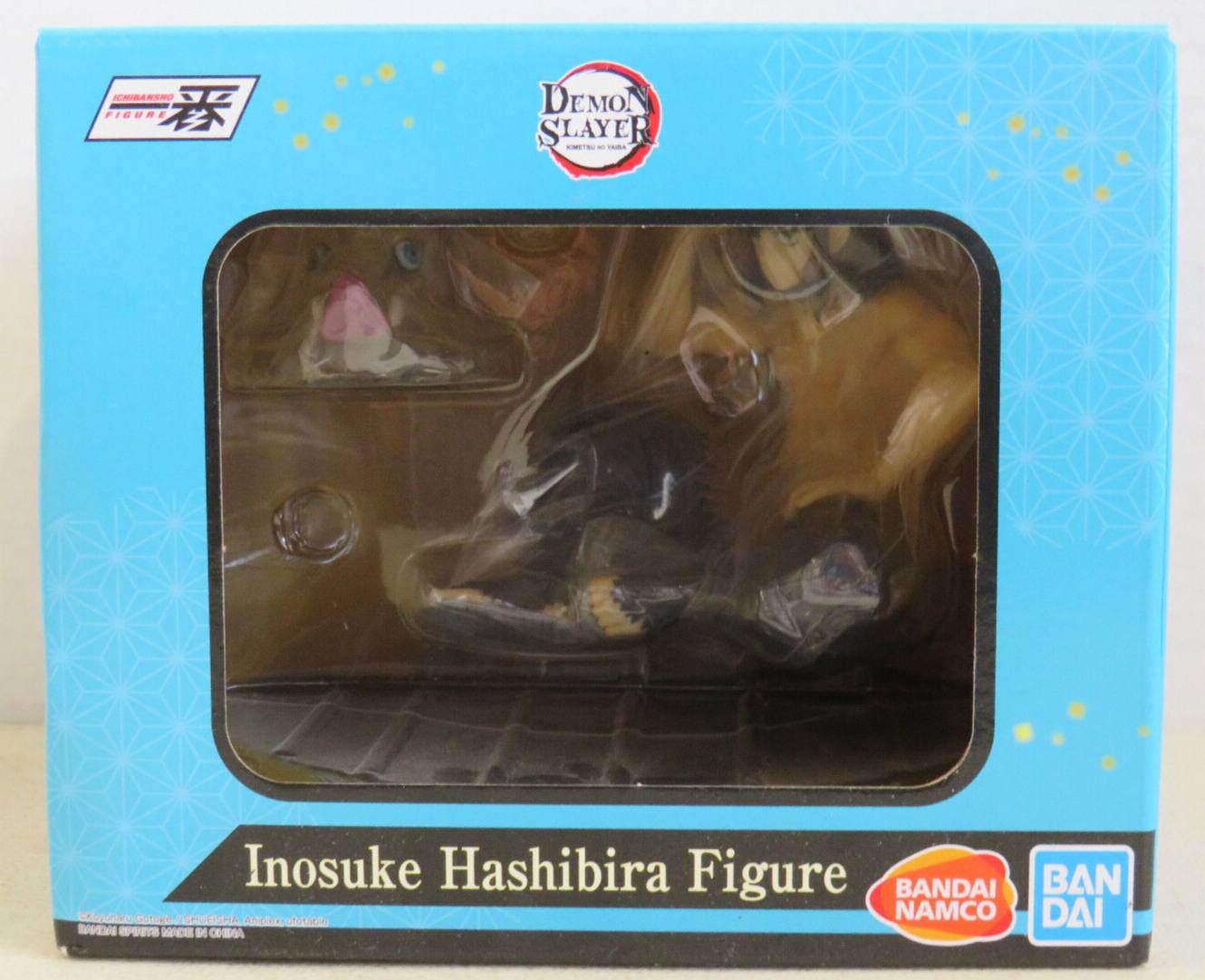 The corrected text is: "ICHIBANSHO FIGURE DEMON SLAYER Inosuke Hashibira Figure BANDAI BAN NAMCO"