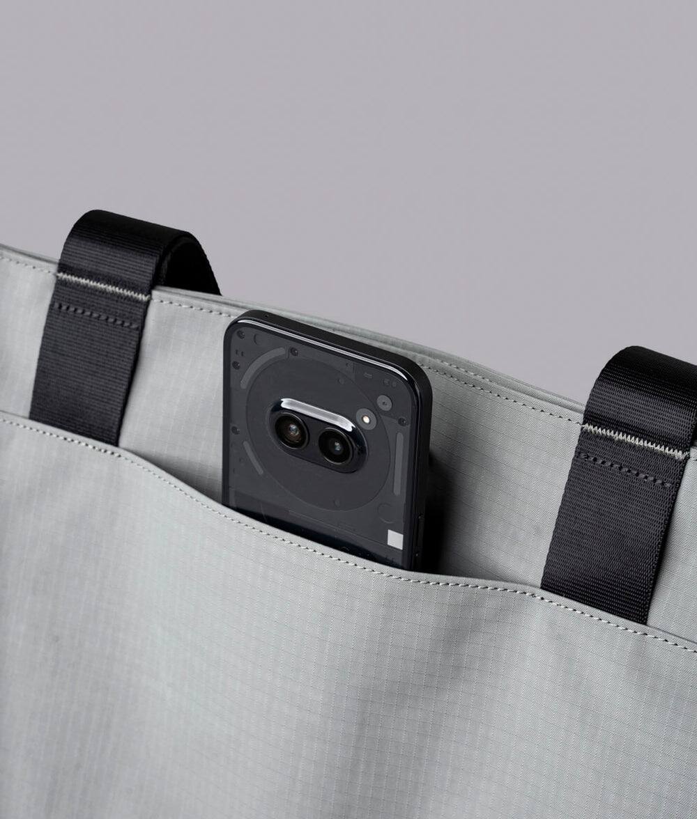 Alt View 5. ALPAKA - Elements Tote 20L Laptop Tote Bag with Padded 16" Sleeve,Open Top with Magnetic Closure - Grey Axoflux 210D.