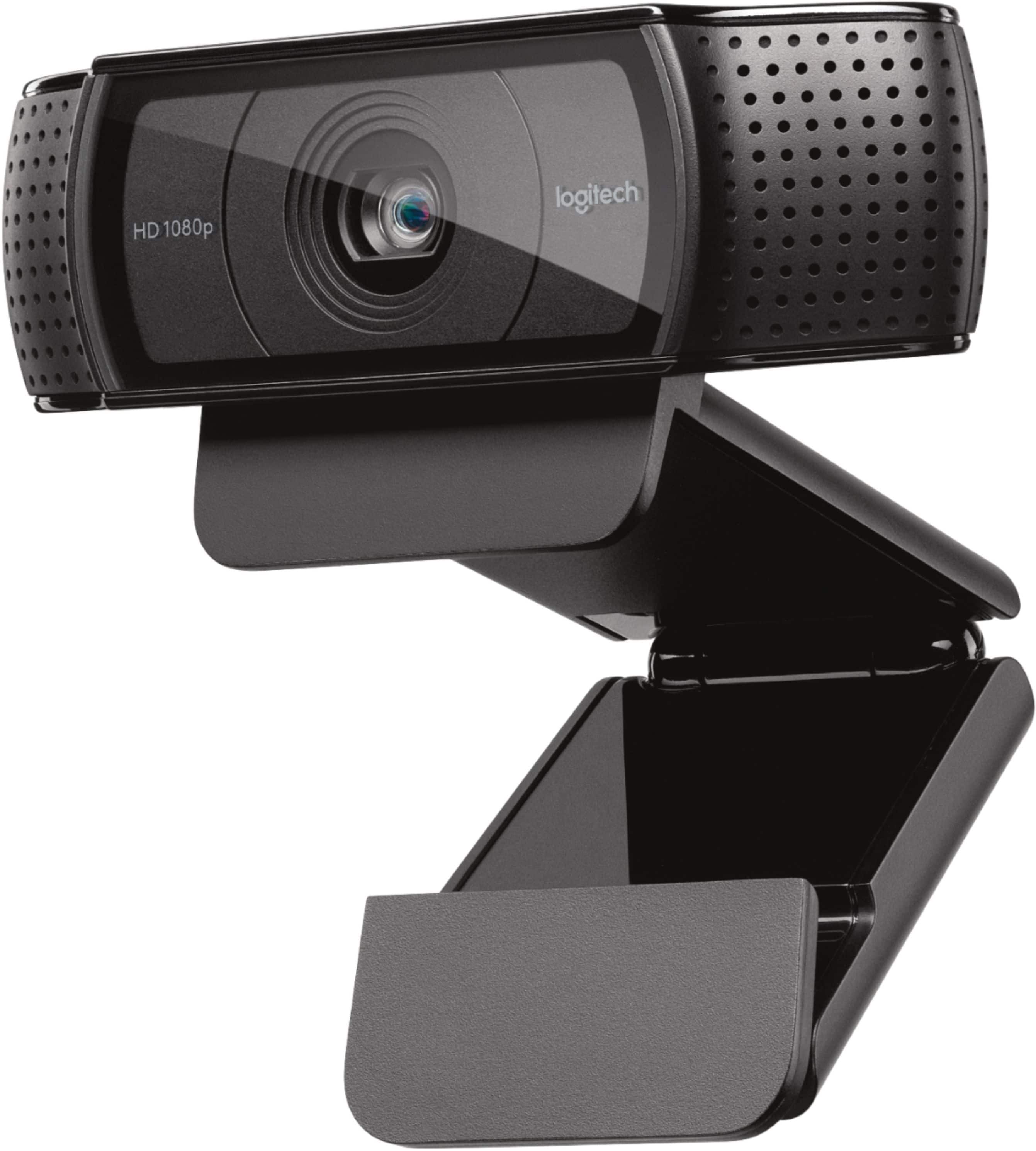 The image features a Logitech HD 1080 web camera, which is a high-quality video camera designed for use with computers. The camera is mounted on a black stand, which provides a stable and adjustable platform for the camera. The stand is equipped with a hinge, allowing the camera to be easily tilted and adjusted to capture the desired viewing angle. The web camera is ready to be used for video conferencing, online meetings, or other applications that require high-quality video and audio.