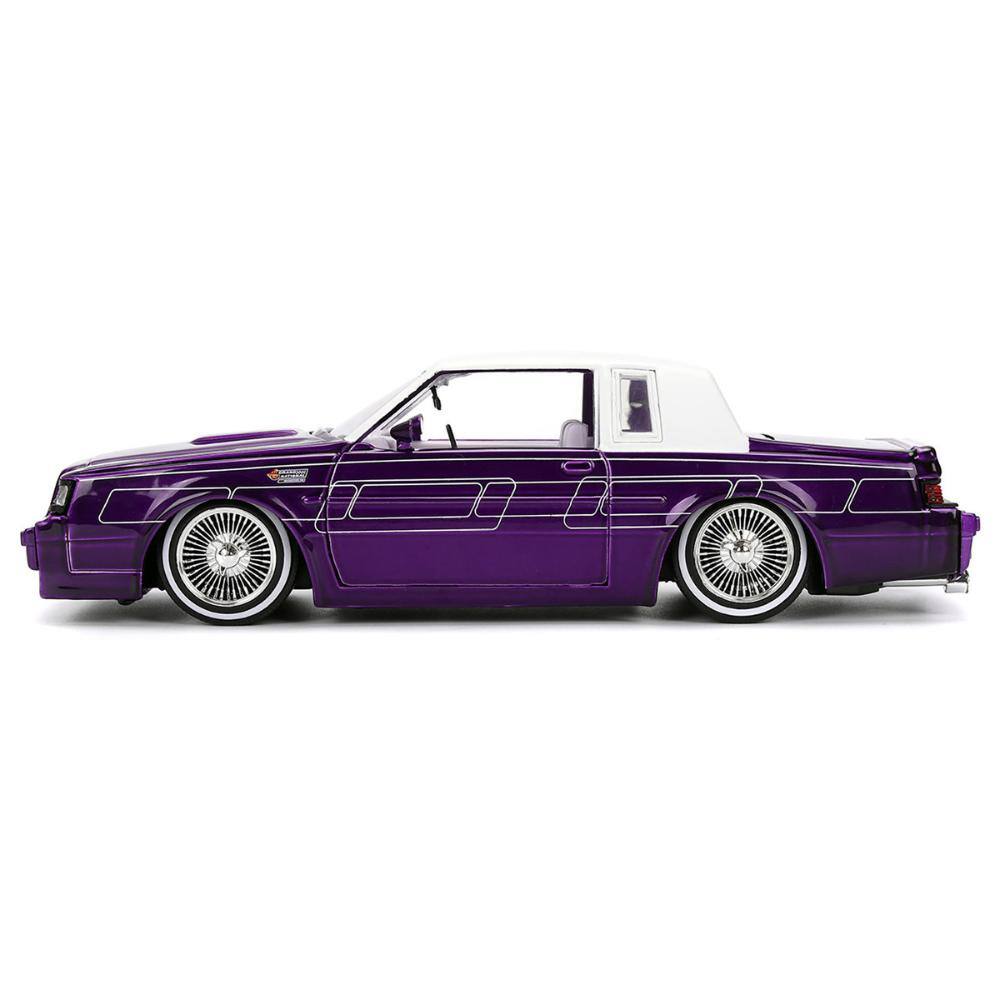 Left. Jada - 1987 Buick Grand National Candy Purple with Graphics and White Top and Interior "Bigtime Muscle" Series 1/24 - Candy Purple and White Top.