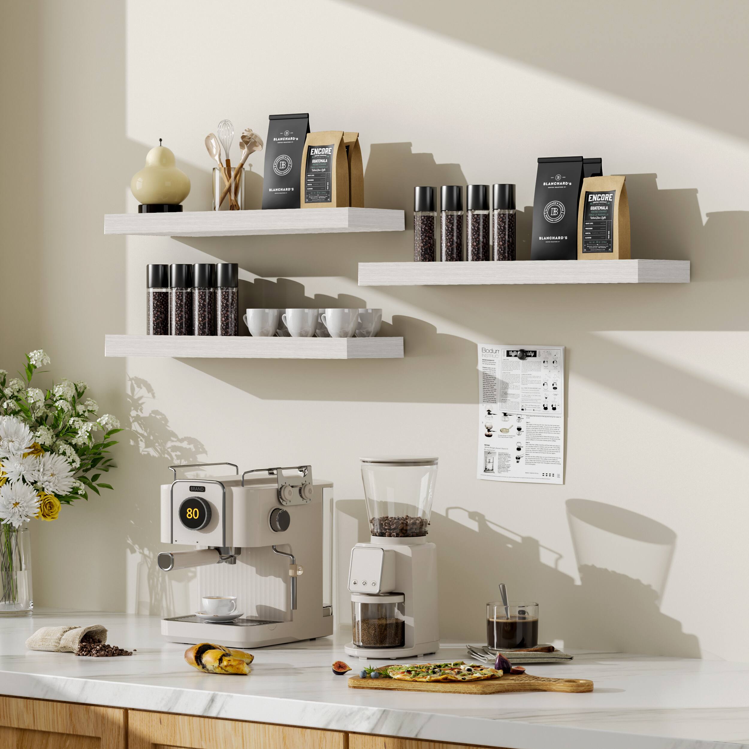 Sure, here is the corrected and grouped text from the image:

**Top Shelf:**
- BLANCARD'S
- ENCORE
- 100% ARABICA
- BLACK LABEL
- ENCORE
- 100% ARABICA
- BLACK LABEL

**Middle Shelf:**
- (No visible text)

**Bottom Shelf:**
- (No visible text)

**Coffee Machine:**
- 80

**Coffee Grinder:**
- (No visible text)

**Manual:**
- (Text is too small to read clearly, but it appears to be a manual or guide)

**Additional Text:**
- (No additional visible text)

This text is extracted from the visible labels and packaging in the image.
