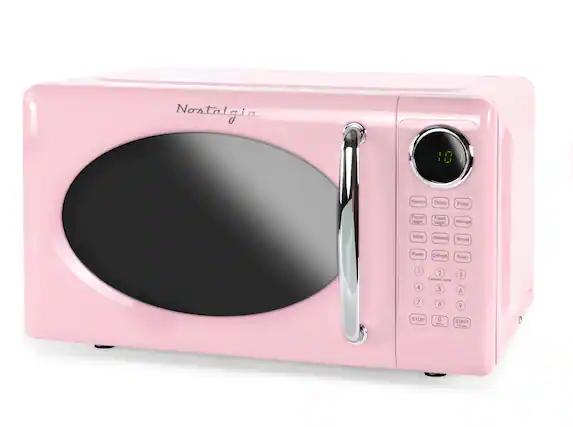 Nostalgia 8801
Popcorn Potato Pizza Frozen Veget Fresh Vegetable Beverage Meat Reheat Bread Power Defrost Timer
1 2 3 Express Cook 4 5 6 7 8 9 STOP 0 - START - d -