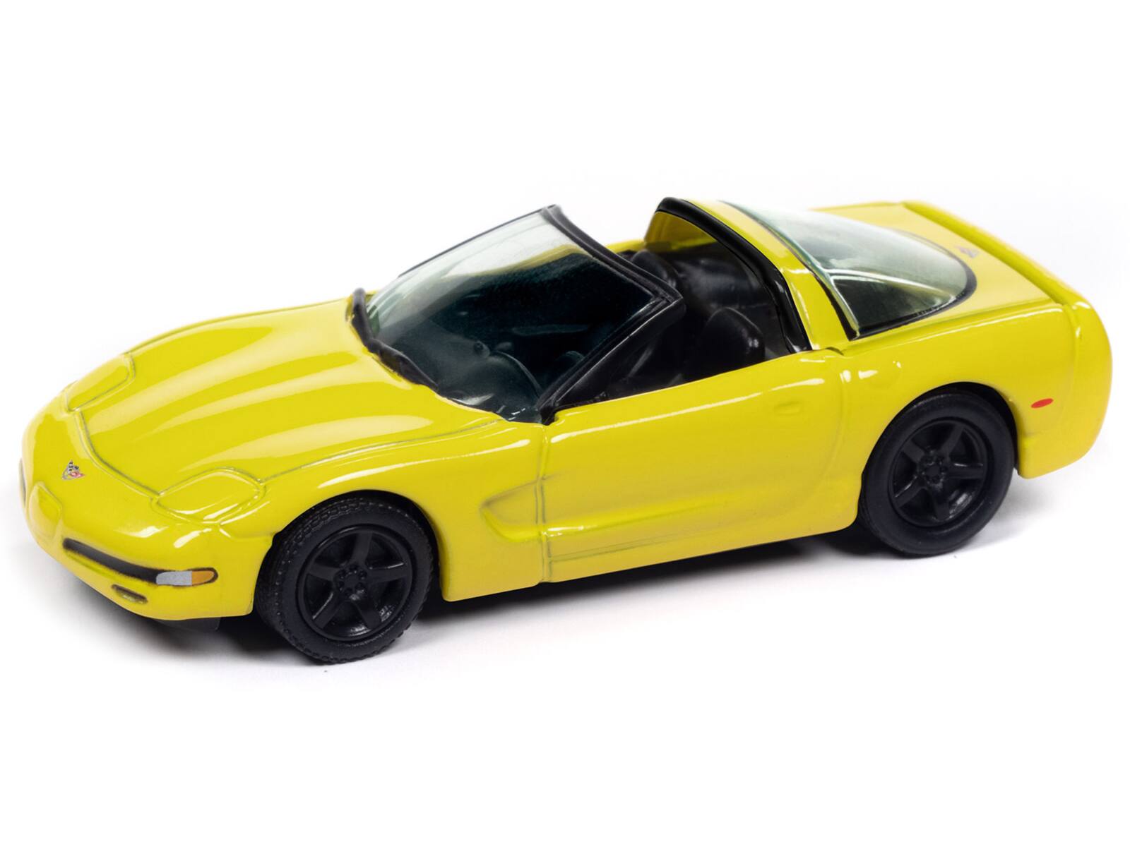 Angle. Johnny Lightning - 2003 Chevrolet Corvette Convertible "50th Anniversary" Millennium Yellow "Classic Gold Collection" 1/64 - Yellow.