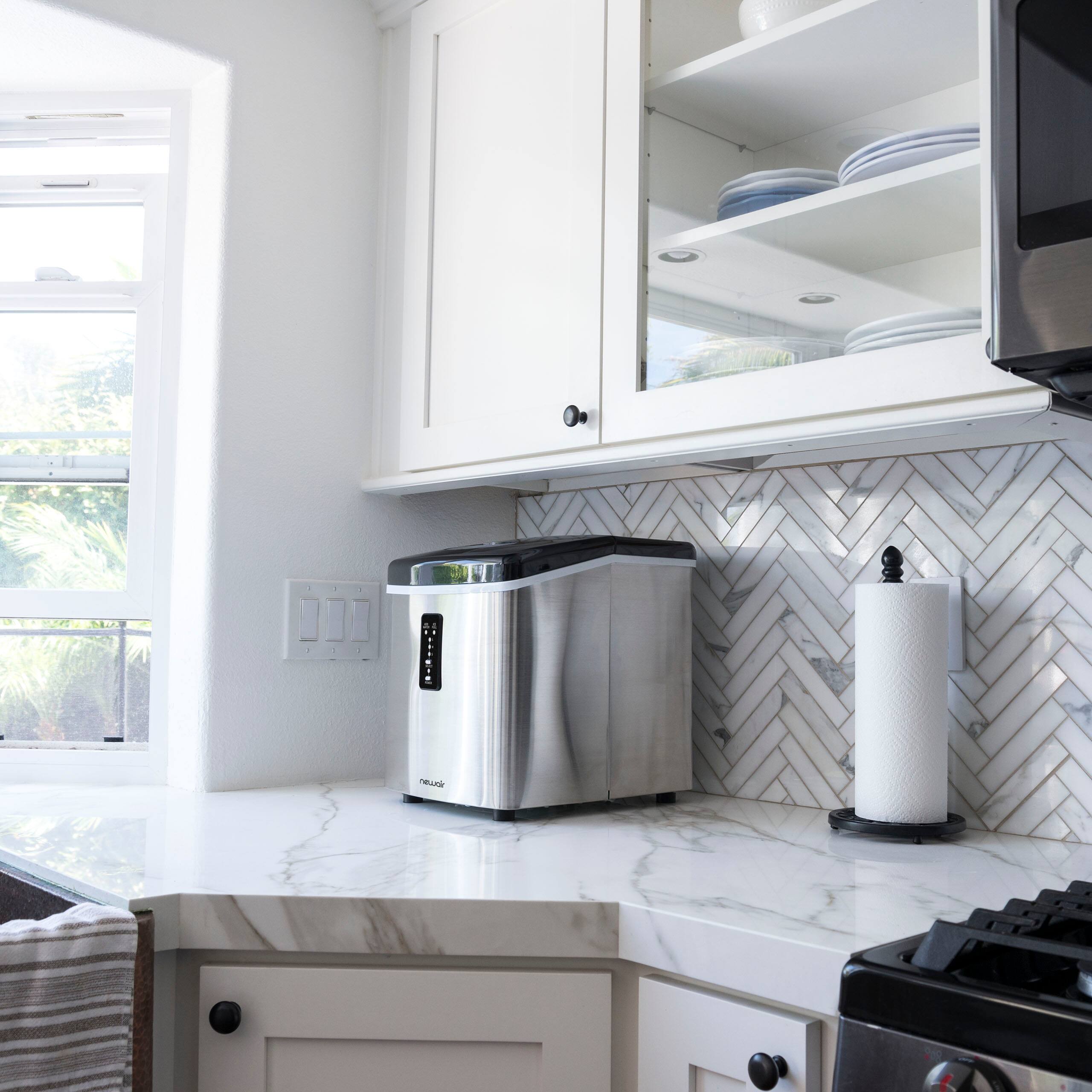 Left. NewAir - 12" 28-lb Portable Bullet Ice Maker with 3 Ice Sizes - Stainless steel.