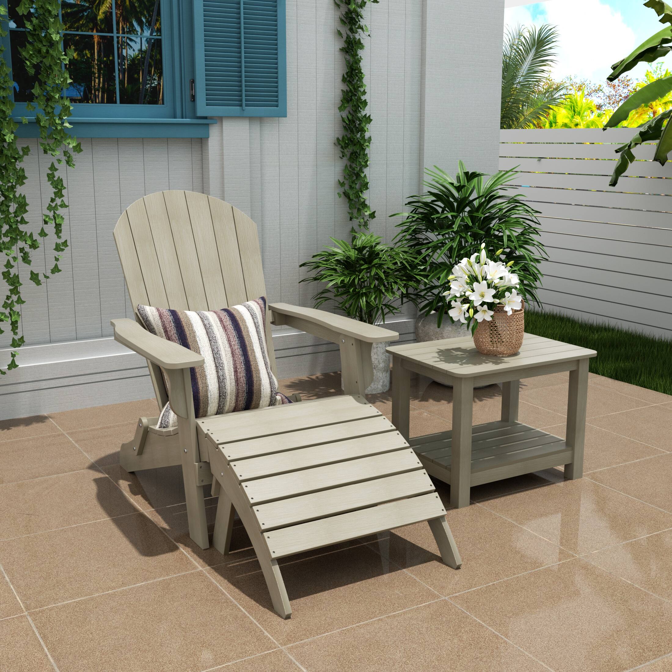 Angle. WestinTrends - WestinTrends Tuscany 3-Piece HIPS Outdoor Folding Adirondack Seashell Chair With Folding Ottoman And Side Table - Weathered Gray.