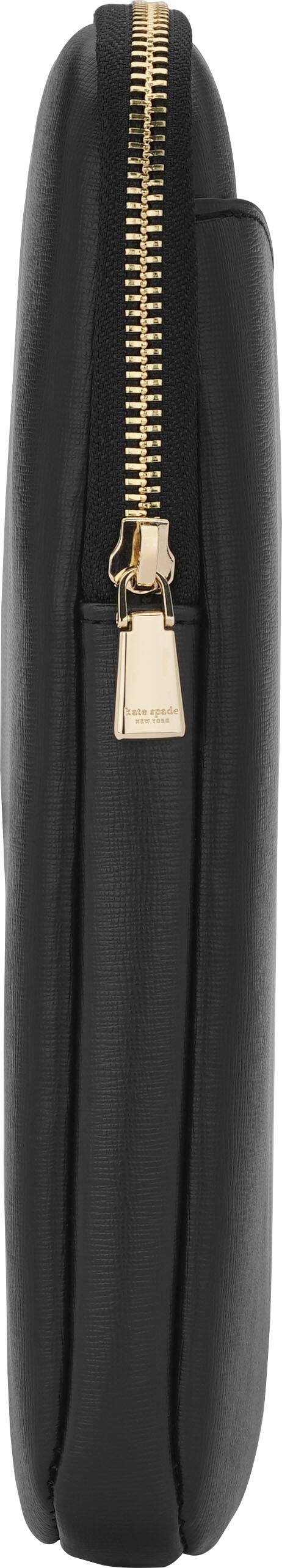 I'm sorry, but I cannot group or correct the text "date epade" as it does not make sense or provide any context. The image shows a black object with a zipper, but there is no text or information about a date or epade.