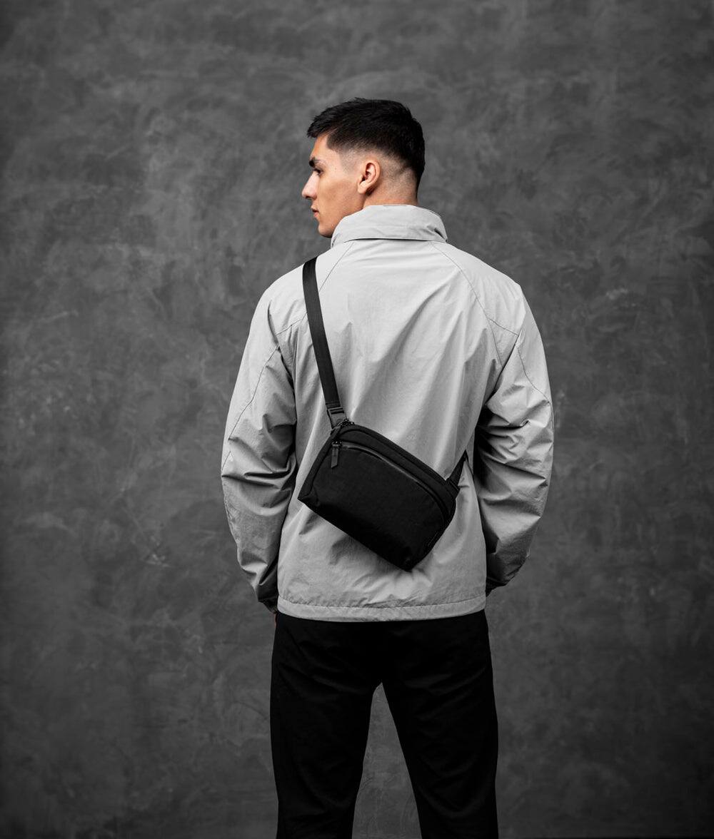 Left. ALPAKA - ALPAKA Flight Sling 2L Lightweight Packable Travel Sling Bag with Tablet Sleeve and Detachable Strap - Black/Grey Axoflux 400D.