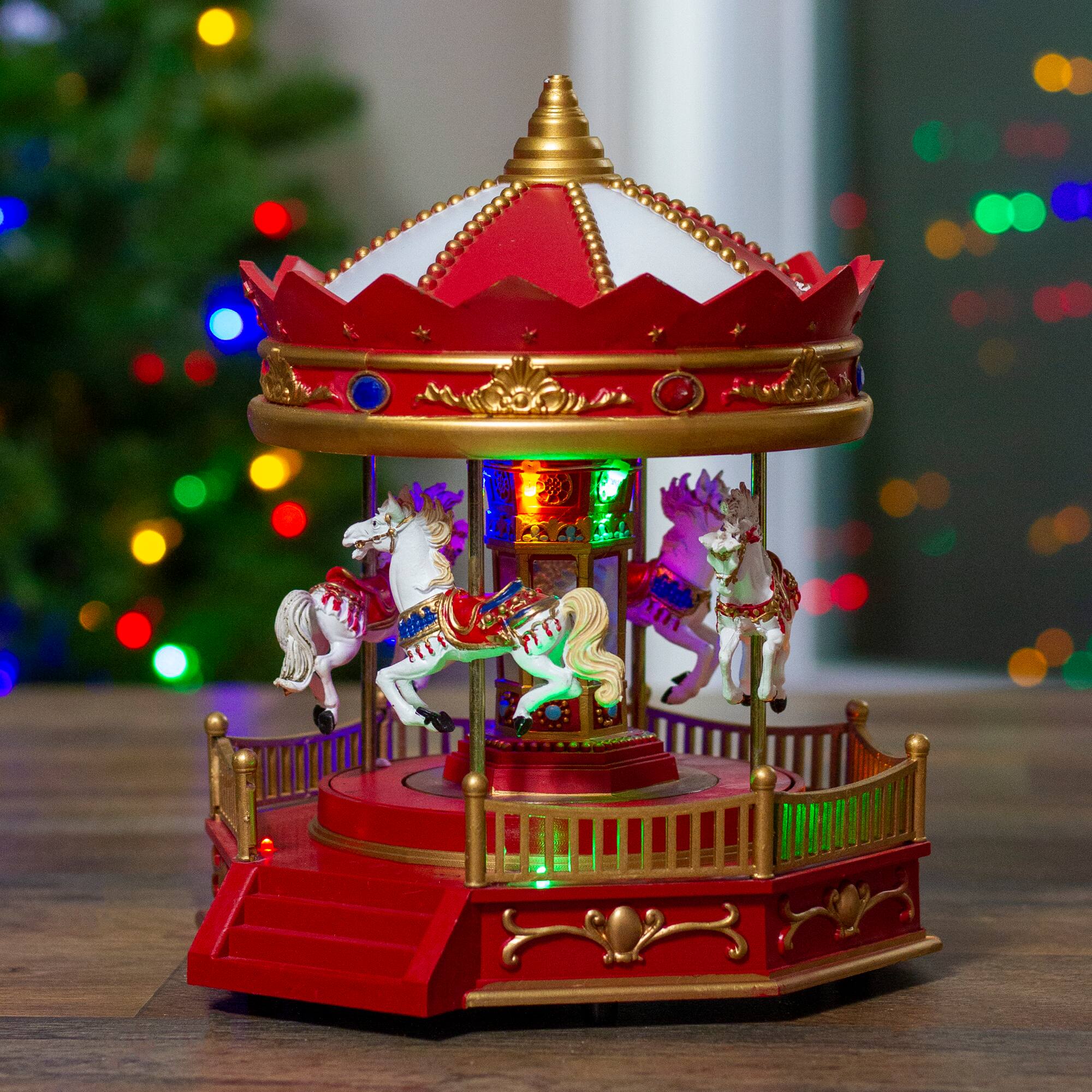 Alt View 1. Northlight - LED Lighted Animated and Musical Carousel Christmas Village Display - 9.25" - Red.
