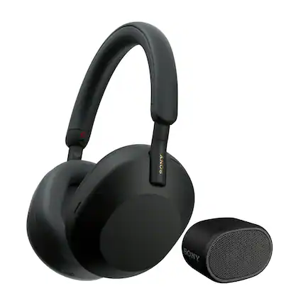 The image features a pair of black Sony headphones and a small black speaker. The headphones are designed to provide an immersive listening experience, while the speaker can be used for hands-free calls or as a portable audio device. The headphones are placed next to the speaker, showcasing their compatibility and functionality.
