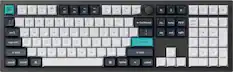 The image shows a close-up of a keyboard with a blue key in the middle. The keys are arranged in a way that makes it easy to type. The keyboard has a combination of white and black keys, with some keys having a blue color. The keys are labeled with numbers and letters, making it convenient for typing. The keyboard also has a space bar and a backspace key, which are essential for typing.