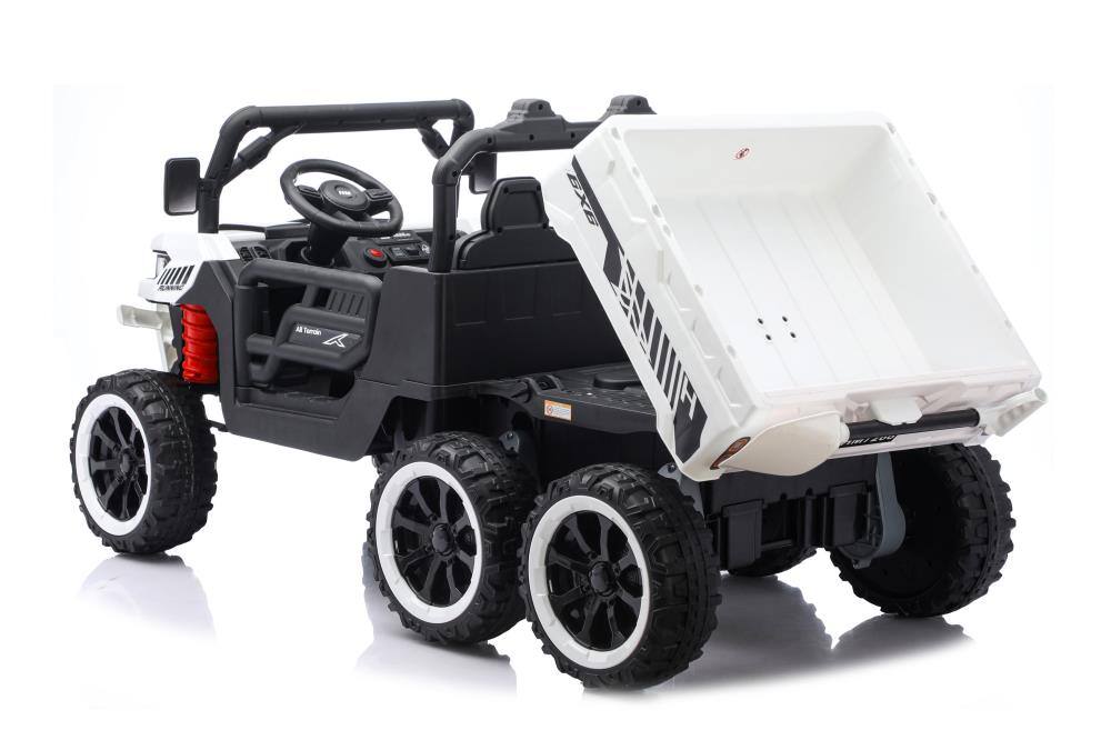 Left. BreeBe - 24V 2-Seater Ride On Dump Truck, 4WD 6-Wheel UTV with Remote, Electric Dump Bed, Shovel, LED Lights & Music, Ages 3+ - White.