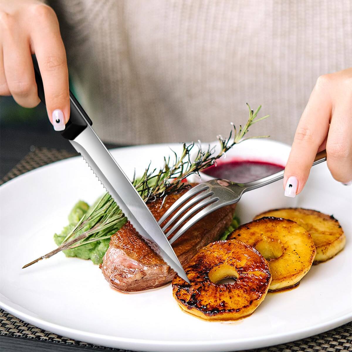 Left. Dazzed Corner - 48-Piece Flatware Set with Steak Knives for 8 - Silver.