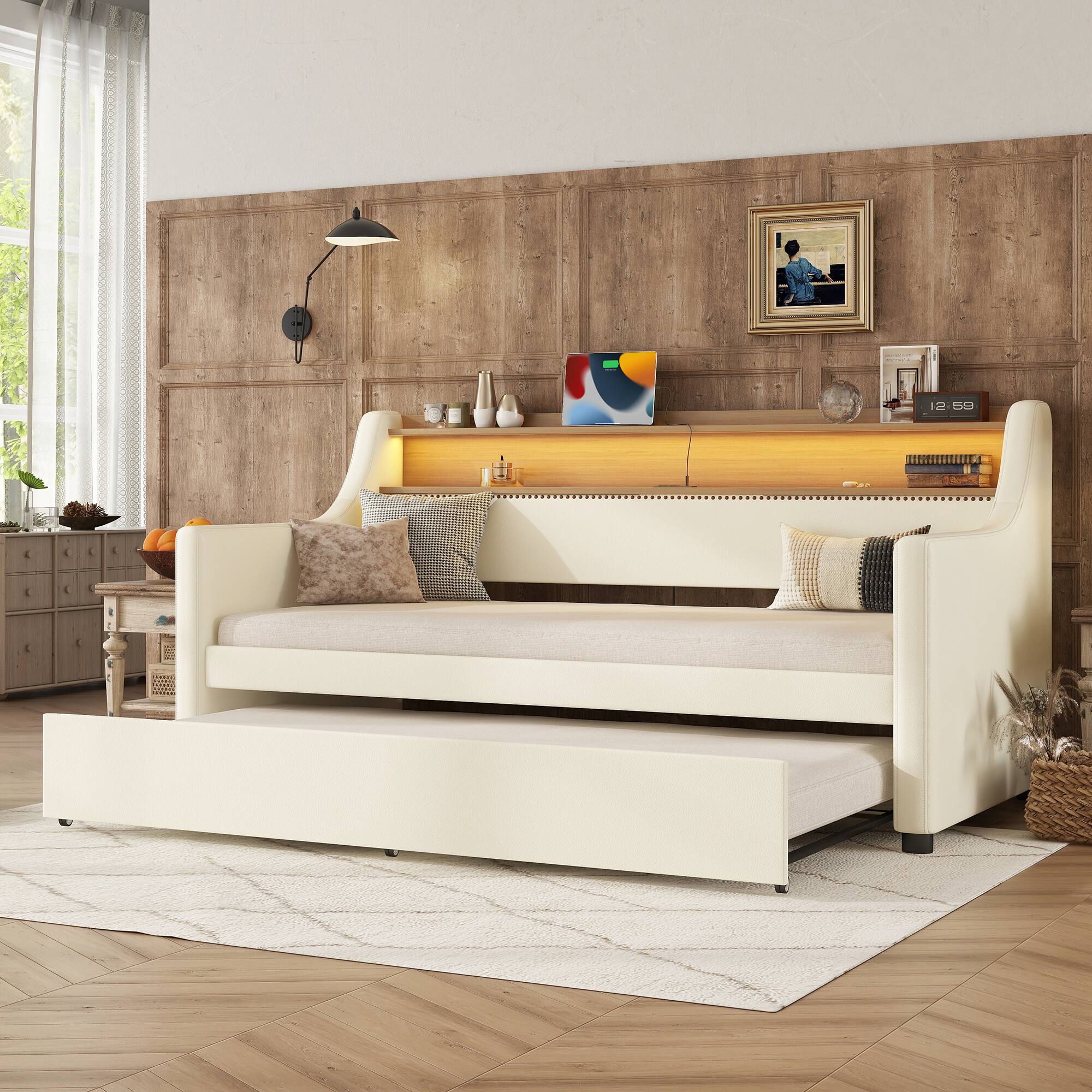 Left. Tiramisubest - Twin Size Daybed with Trundle, Upholstered Daybed with Charging Station and LED Lights, White - White.