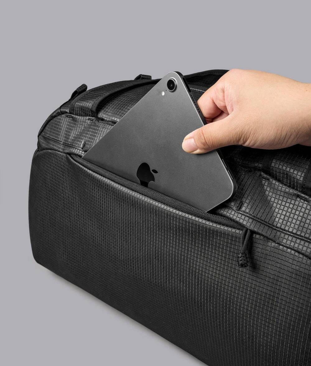 Alt View 8. ALPAKA - 35L Lightweight Duffel Bag for Gym, Weekend Trips & Carry-On Travel, Momentum Duffel, Weather-Resistant - Axodyne hybrid Black.