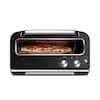Breville is a brand that makes a single-slice toaster oven. The image shows a pizza inside the oven, which is a popular food item to be toasted in a toaster oven. The oven is designed to provide even heating and a crispy crust for the pizza.