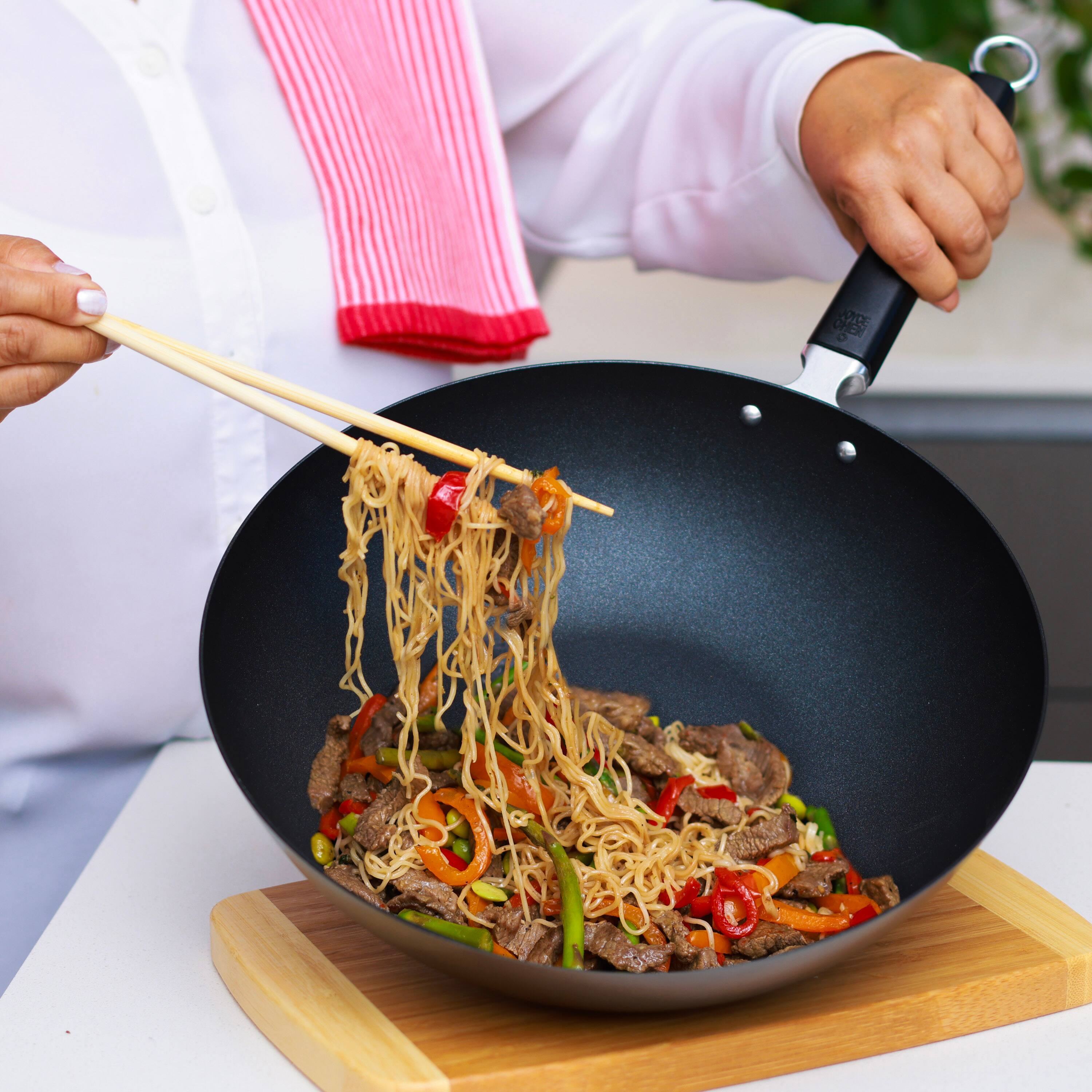 Alt View 7. Escali - Joyce Chen Professional Series 12-Inch Carbon Steel Excalibur Nonstick Stir Fry Pan with Phenolic Handle - Black.