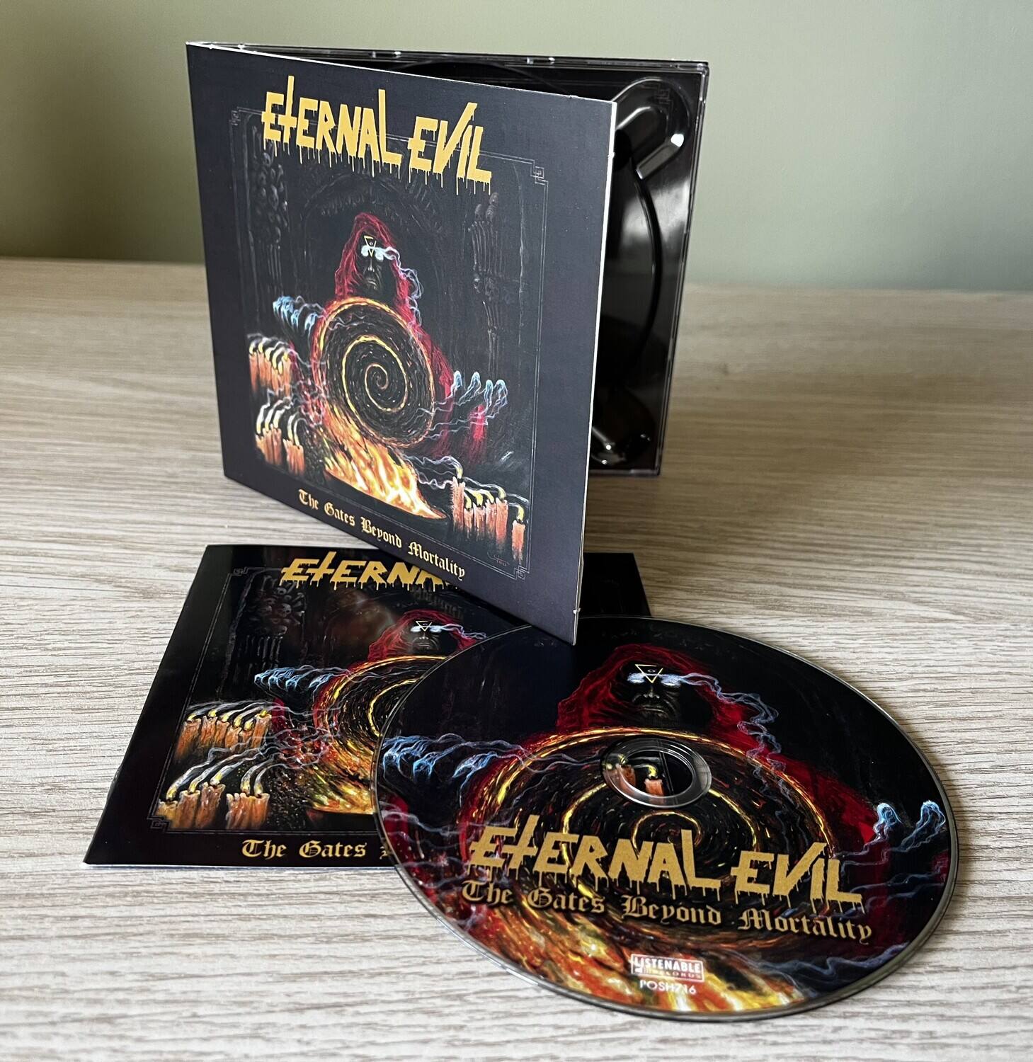 Eternal Evil  
The Gates Beyond Mortality  

Eternal Evil  
The Gates Beyond Mortality  

LISTENABLE  
POSH