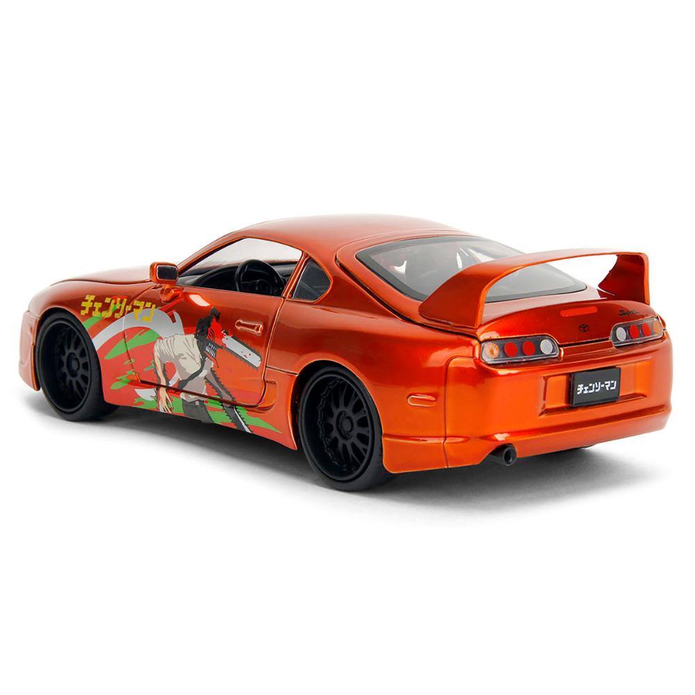 Jada 1995 Toyota Supra Orange w/ Graphics & Chainsaw Man Figure